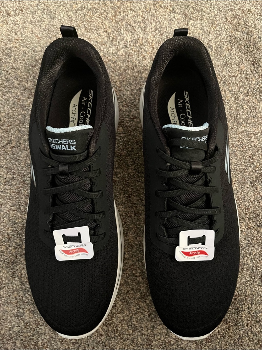 Skechers Men's Black Walking Sneakers with White Soles
